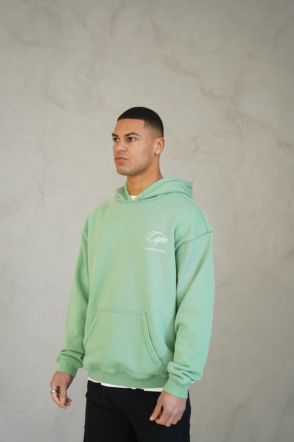 Capo International Hoodie - Washed Green