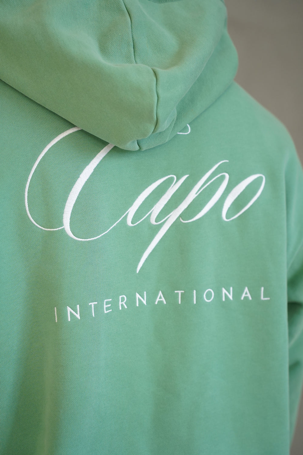 Capo International Hoodie - Washed Green