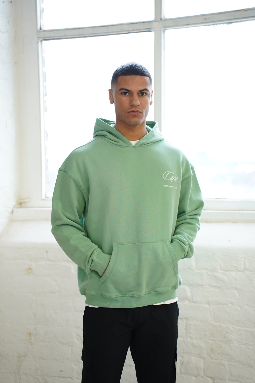 Capo International Hoodie - Washed Green