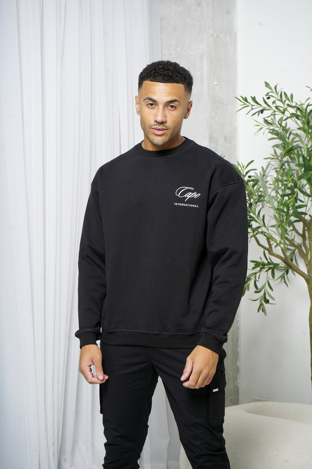 Capo International Sweater - Black
