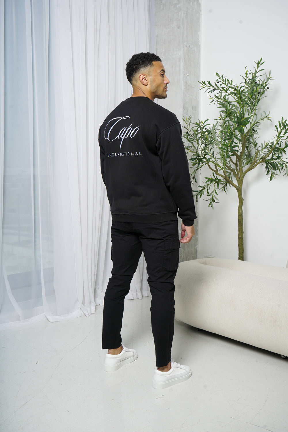 Capo International Sweater - Black
