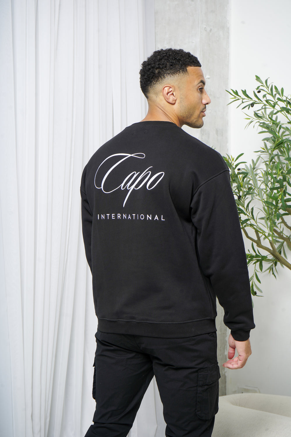 Capo International Sweater - Black