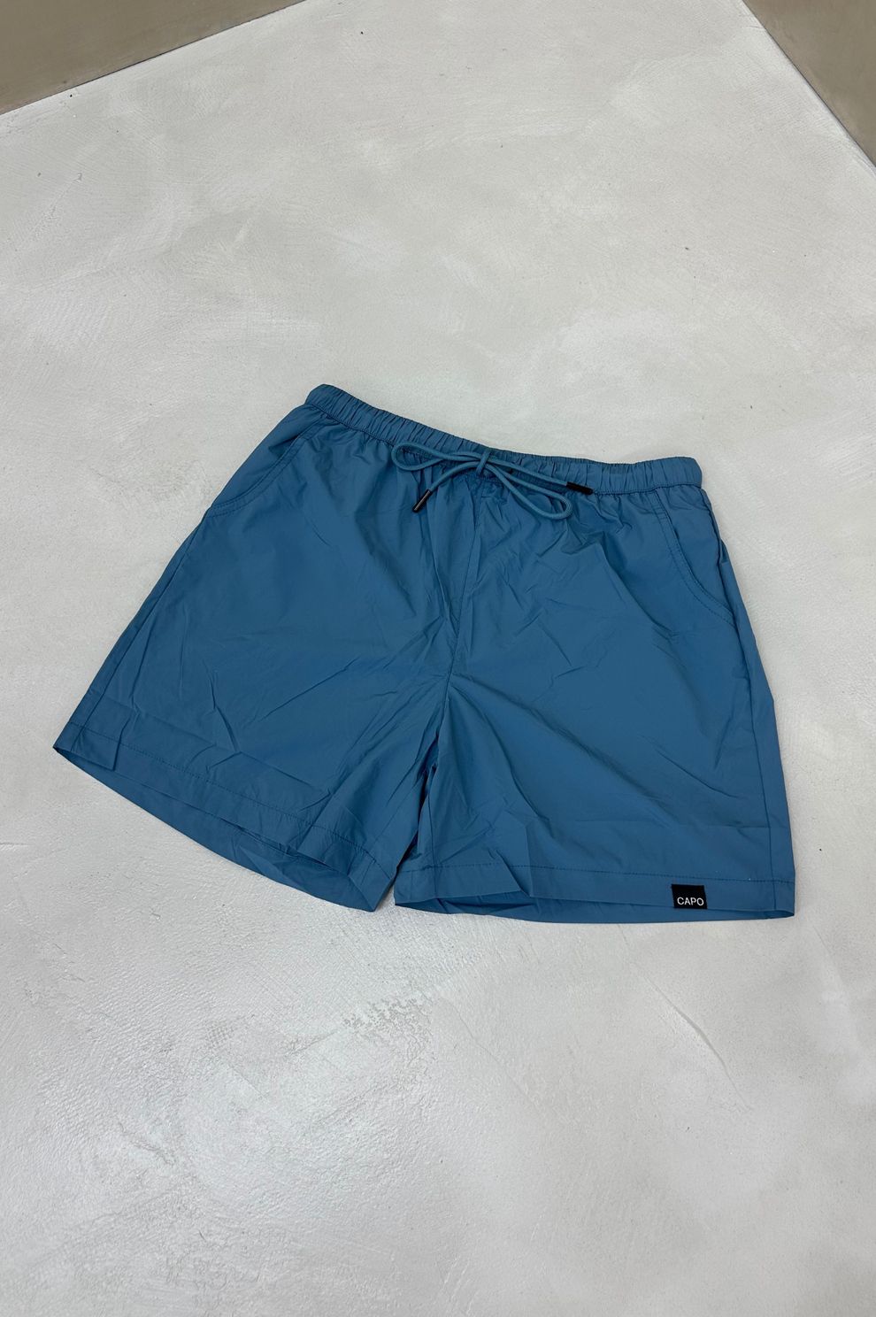 Capo ESSENTIAL Swim Short - Steel Blue – CAPO | Meaning Behind The Brand