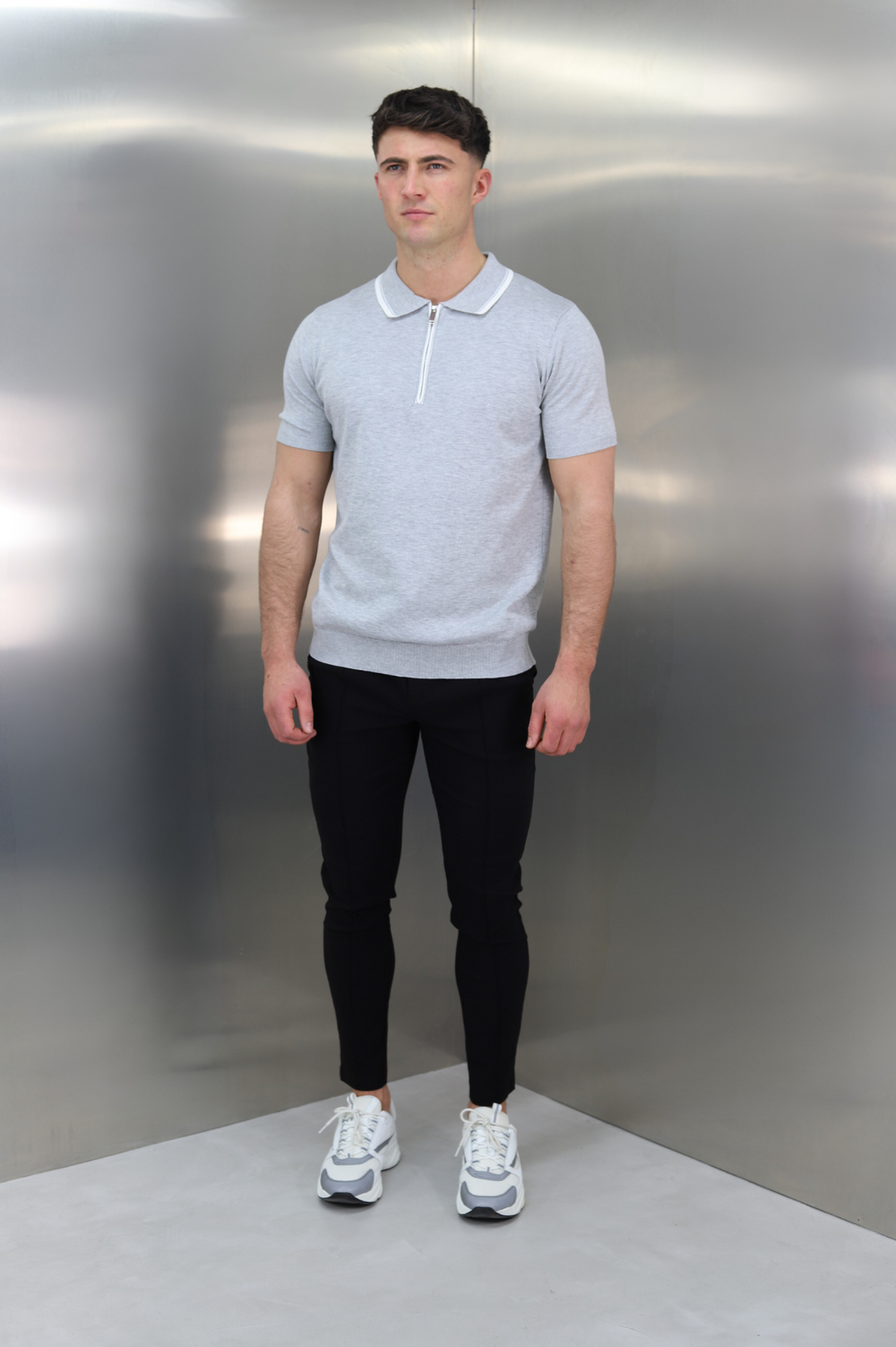 White polo online grey pants