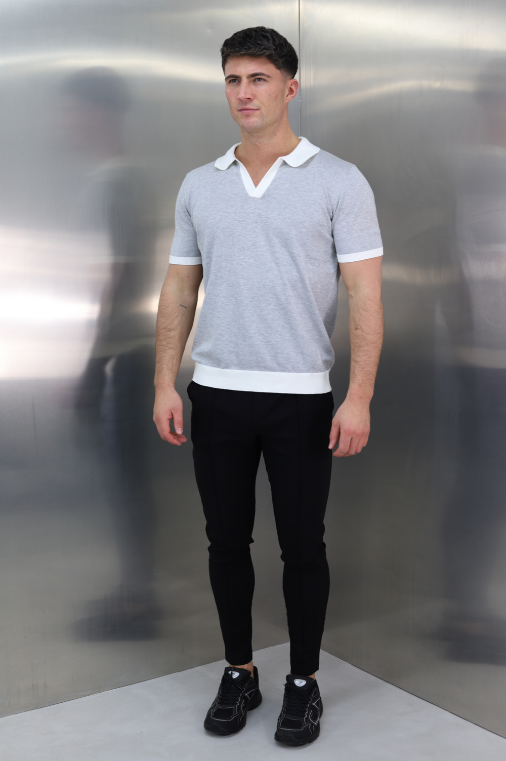 Grey pants online white polo