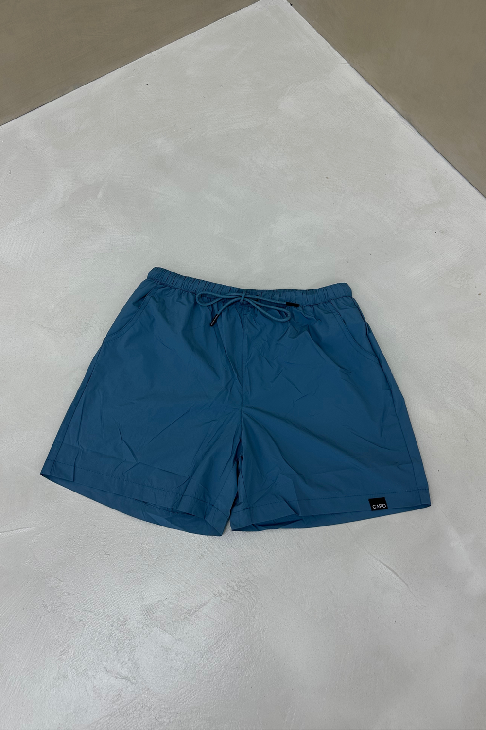 Capo ESSENTIAL Swim Short - Steel Blue – CAPO | Meaning Behind The Brand