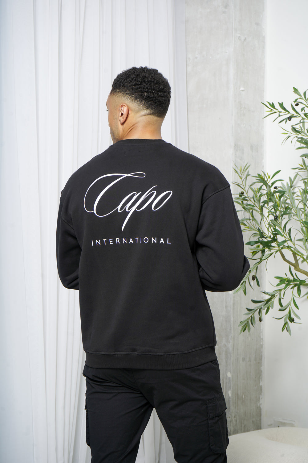 Capo International Sweater - Black