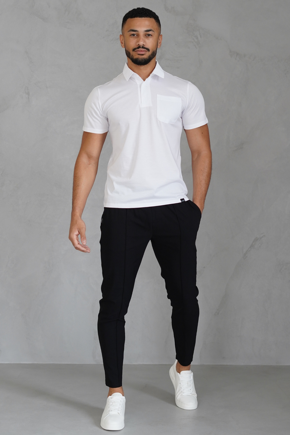 White polo 2024 with black pants